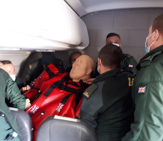 A Bariquin bariatric training mannequin on a stretcher