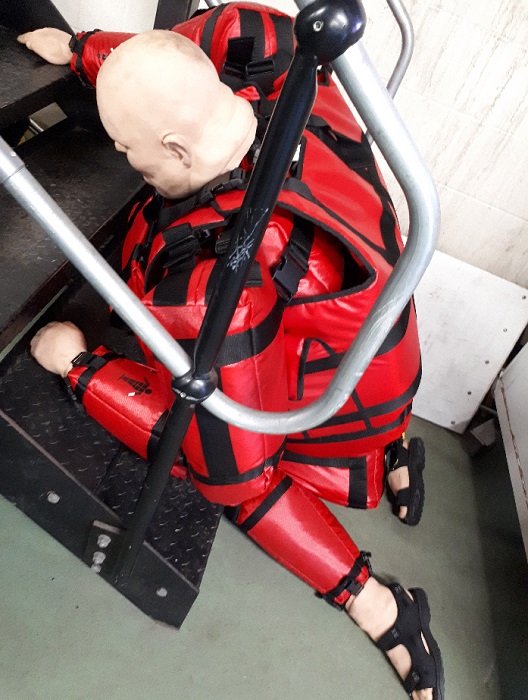 A Bariquin bariatric training mannequin on a stretcher